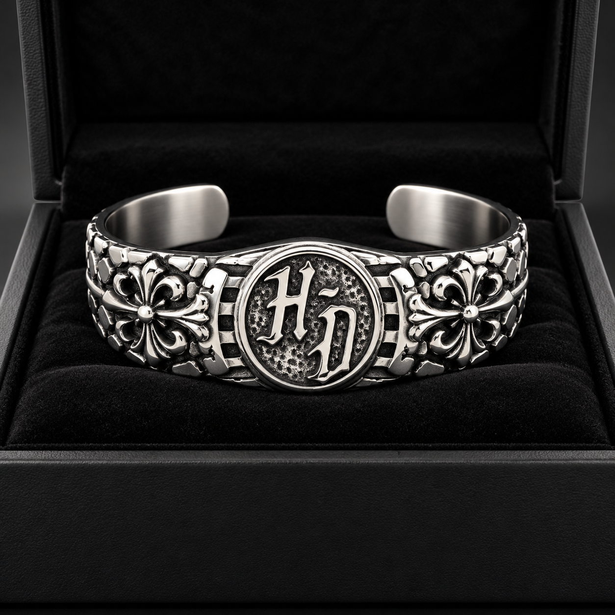 Monogram chain biker bracelet displayed in a box